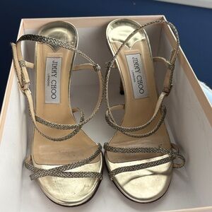 Jimmy Choo high heeled sandals.